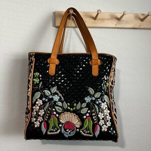 Consuela Black Quilted Tote with Multicolor Floral Embroidery and Tan Handles